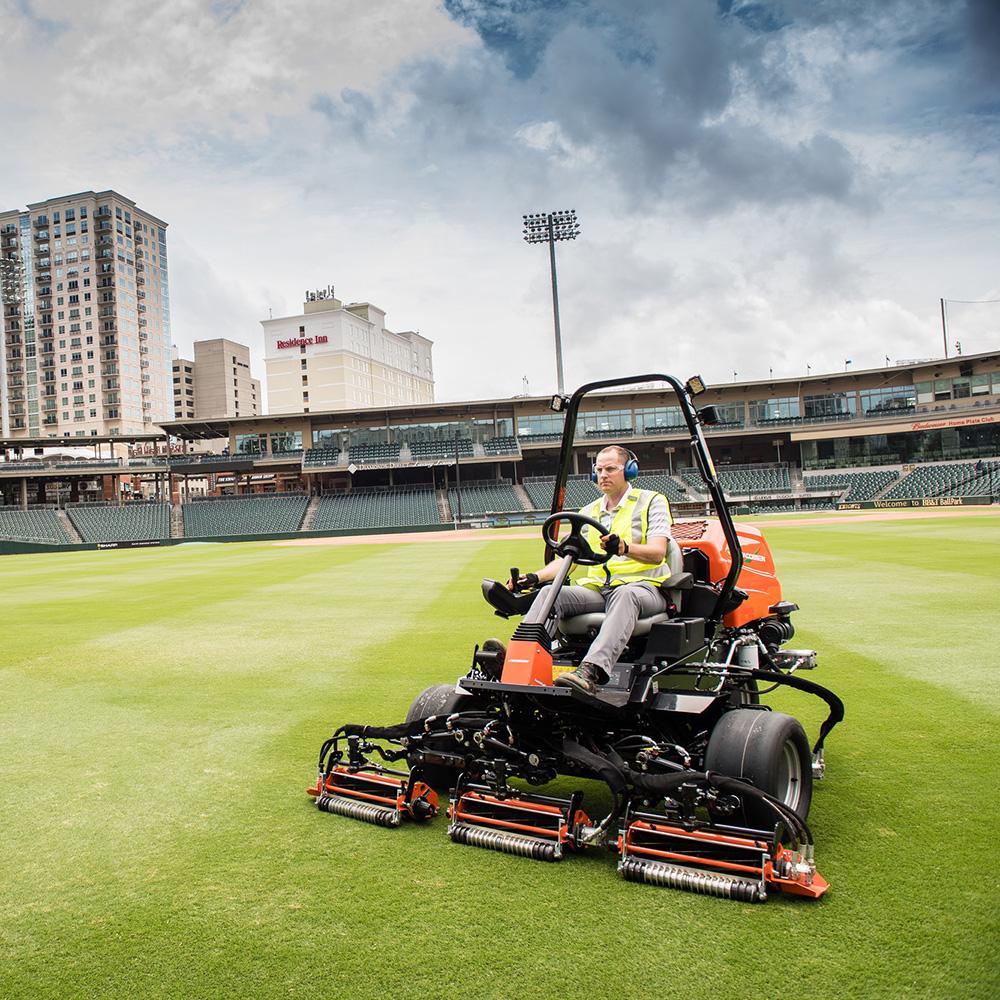 mower on baseball field